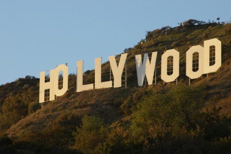 Hollywood: the land of movie premiers, double-decker tourist buses, and sidewalk characters. [Wikipedia]