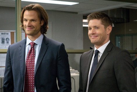 Sam and Dean are smiling now, but those grins don't appear when the brothers debate God and the Darkness [Source: Liane Hentscher/The CW]
