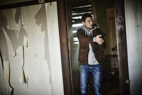 HUNTERS -- "The Beginning & The End" Episode 101 -- Pictured: Nathan Phillips as Flynn Carroll -- (Photo by: Ben King/Syfy)